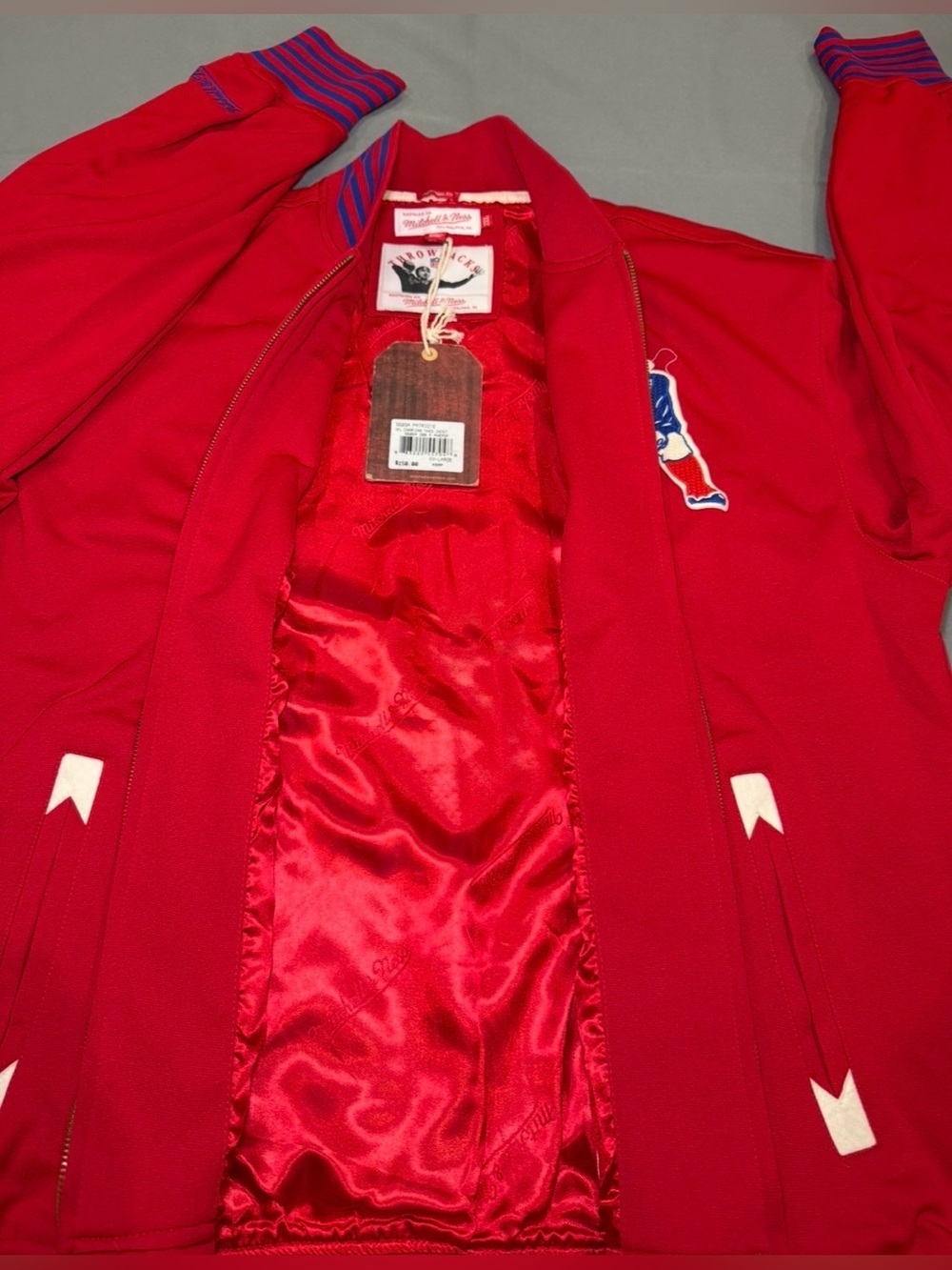 Mitchell & Ness New England Patriots Red Mens Jacket with Blue Stripe Cuffs